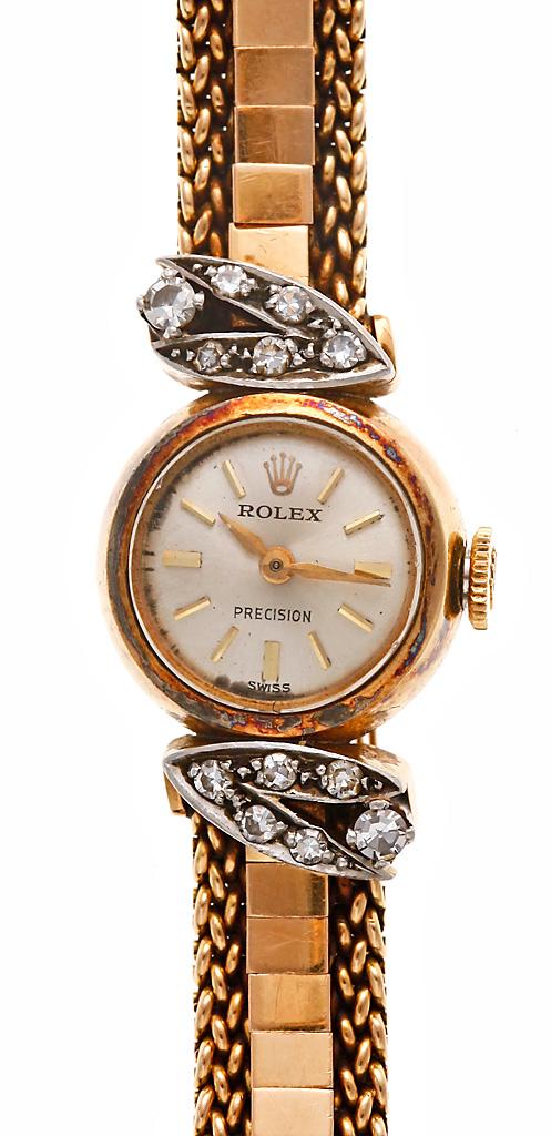 женские золотые часы с платиной и бриллиантами Rolex